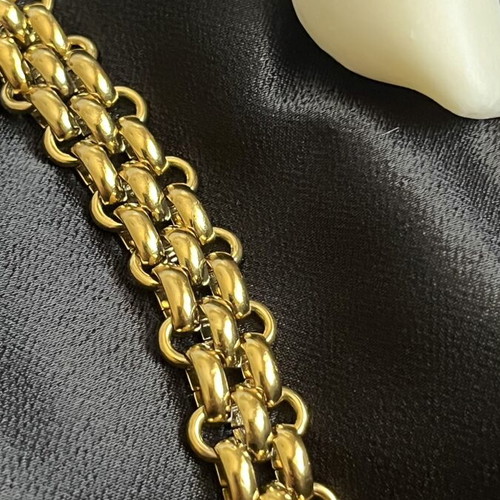 Bracelet made of gold-plated steel, new