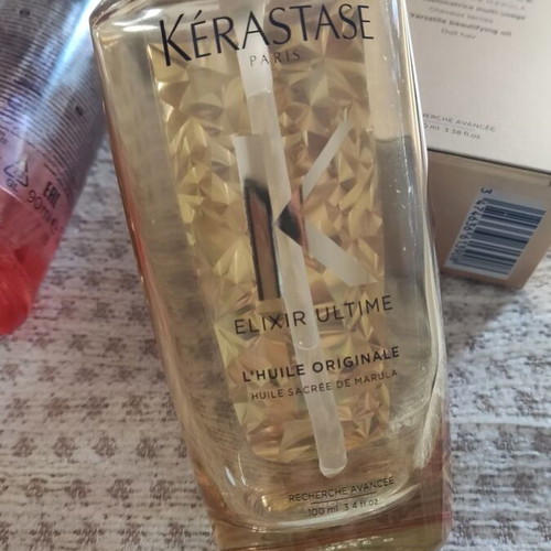 Kerastase Elixir Ultime glass bottles, collectible gold bottle