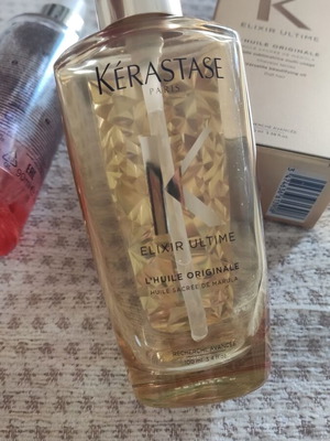Kerastase Elixir Ultime glass bottles, collectible gold bottle