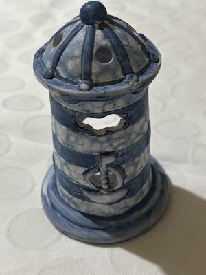 Small striped decorative lighthouse candle holder