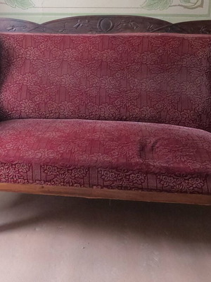 Wooden three-seater sofa used with 6 chair seat covers, carved details