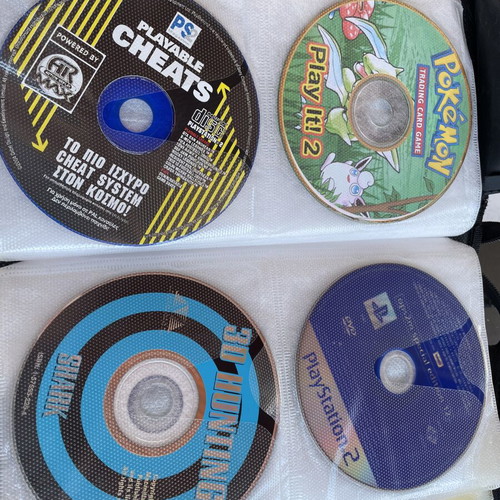 Vintage PC and PlayStation 2 gaming bundle with case, 70 CDs/DVDs