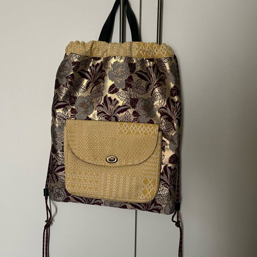 Boho backpack unused, gold shades