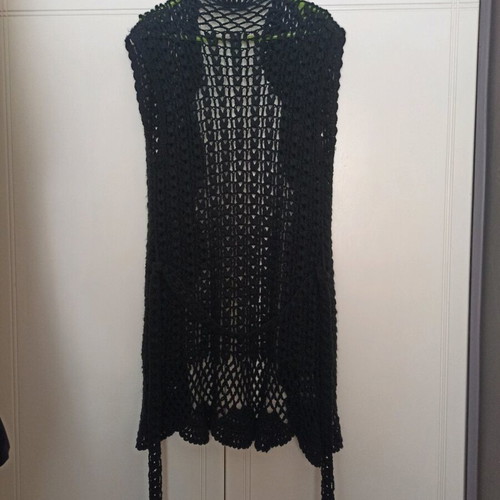Knitted openwork kazaka in black color like new, size medium - large