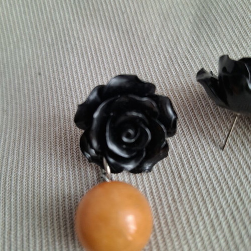 Folli Follie Earrings like new, black rose design with orange bead