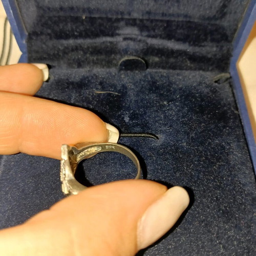 Silver women's ring like new with olive stones