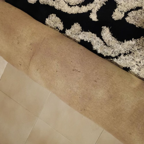 Black and white rug with embossed designs 226x152 cm