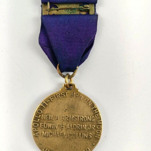 Apollo 11 collectible bronze medal and gold-plated keychain like new