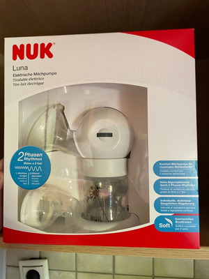 Breast pump new, intact