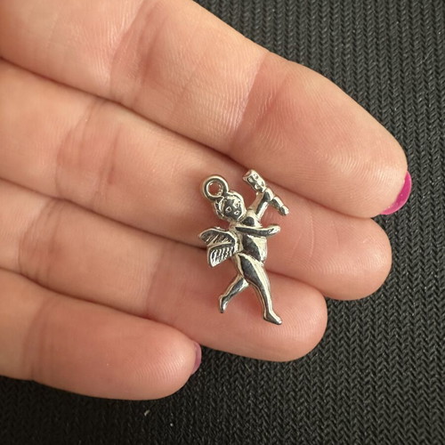 Metal silver Cupid charm like new for jewelry and crafts
