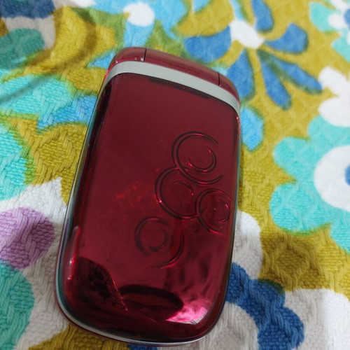 Alcatel vintage flip phone used, red, charger included