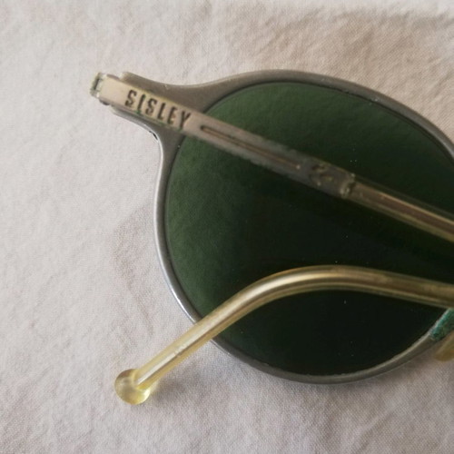Sisley sunglasses used with silver metal frame and green lenses