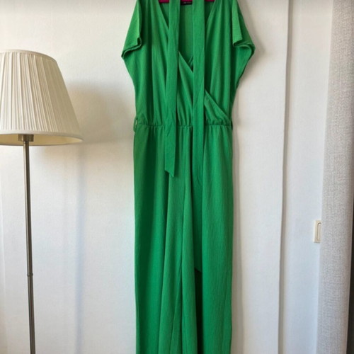 Emerald green one-piece jumpsuit with sleeves and waist belt