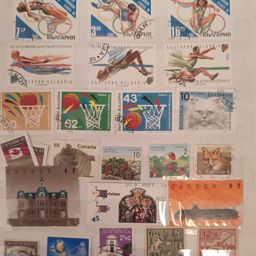 Stamp collection like new, 500+ worldwide in album