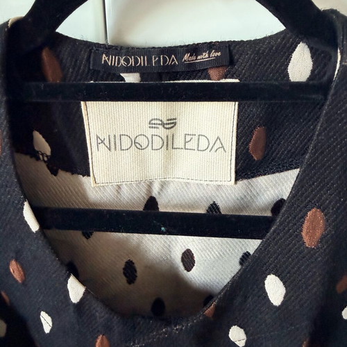 Nidodileda vest like new, black and red