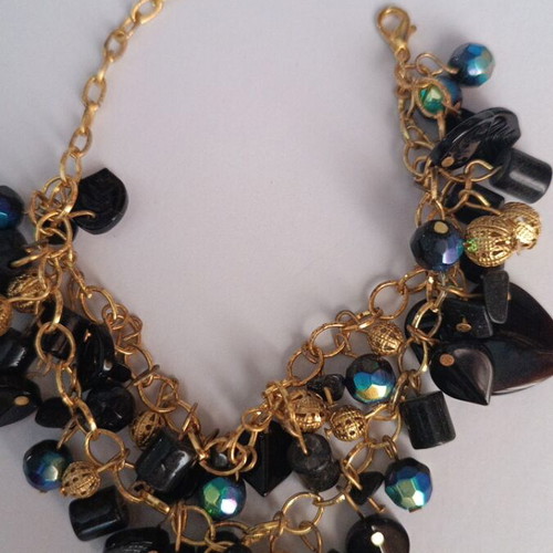Gold bracelet with black charms and holographic design new