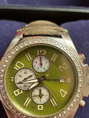 Rhythm green watch with zircon used, with many extras