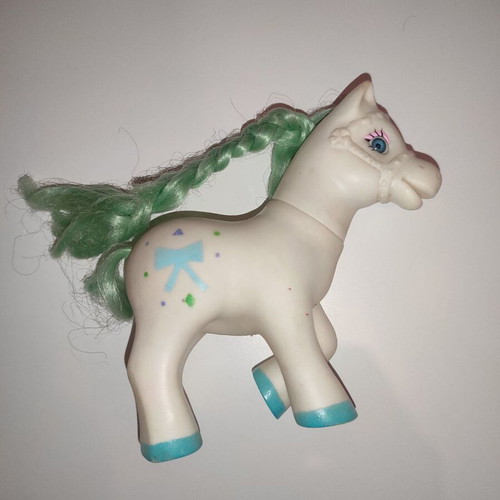 Gi-Go Tootsie Pose pony used with bridle and painted hooves