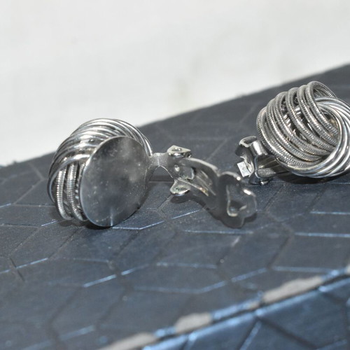 Vintage women's clip-on earrings silver color spiral design used