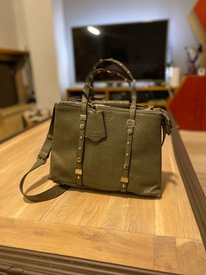 Guess crossbody bag green like new with minor wear