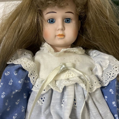 Porcelain doll Germany from the 70s like new