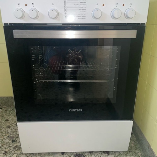 Pitsos oven like new with two baking trays and active warranty