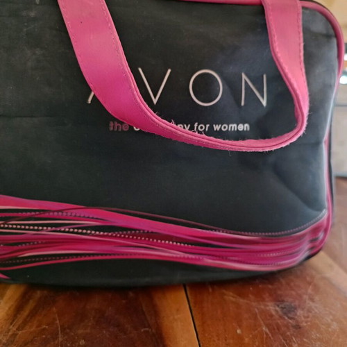 Avon cosmetic bag used, black and pink, collector's edition