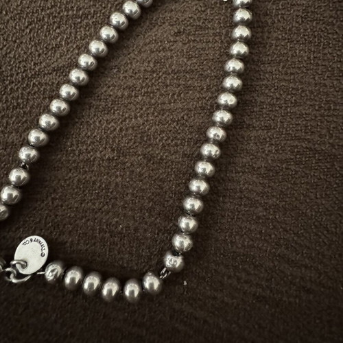 Tiffany & Co silver bracelet like new with missing charm