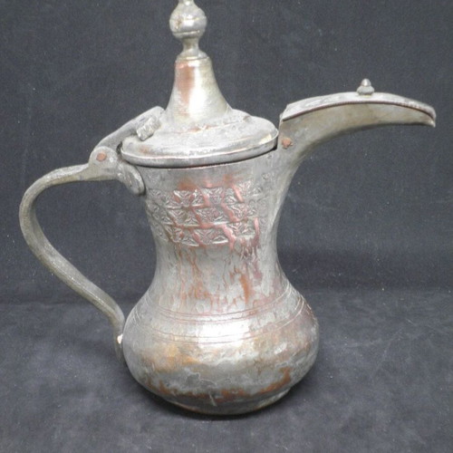 Antique copper coffee kanati used with engraved oriental designs