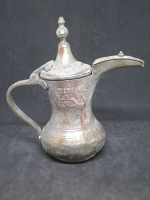 Antique copper coffee kanati used with engraved oriental designs