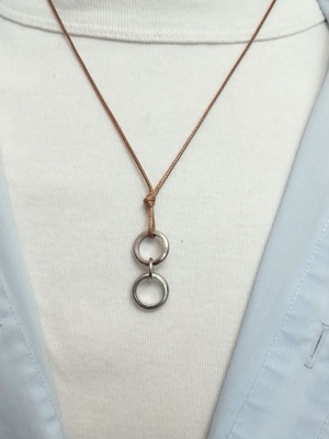 Men's chocolate pendant with silver circles