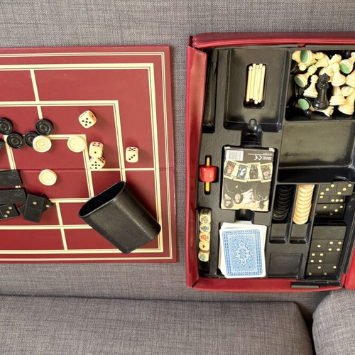 Vintage board games set used with chess, checkers, dominoes and cards