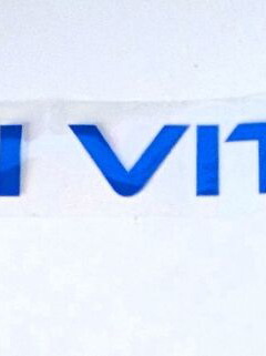 Suzuki Vitara blue sticker with 2 white phosphorescent Suzuki decals