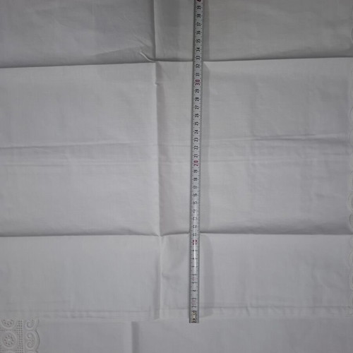Vintage white linens with intricate cutwork embroidery, new