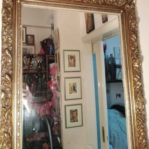 Antique mirror used with carved frame in gold crackle finish