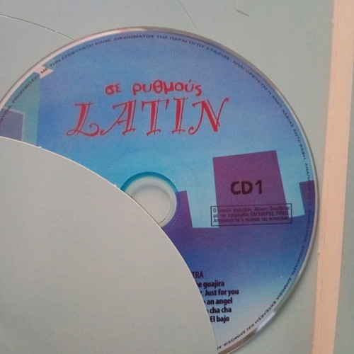Se Rythmous Latin box set used, includes first CD only