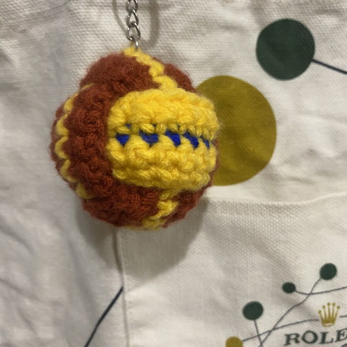 Crocheted ball keychain new, brown multicolor