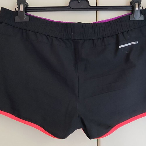 Reebok women's PlayDry ZigTech running shorts used, black and purple, size M