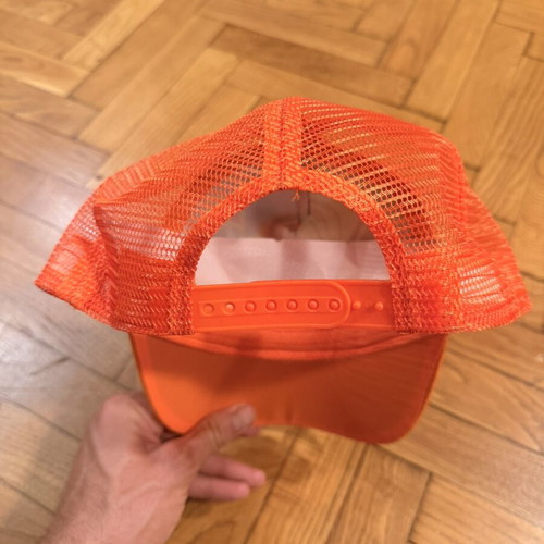 Orange hat with colorful pattern new, unused