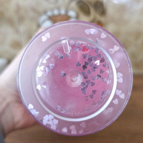 Plastic water bottle pink with designs and glitter, new