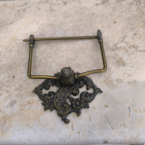 Bronze toilet paper holder used