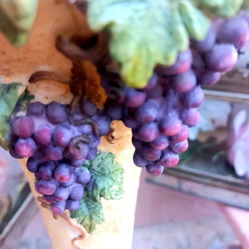 Vase used about 0.25m high with grapes decoration