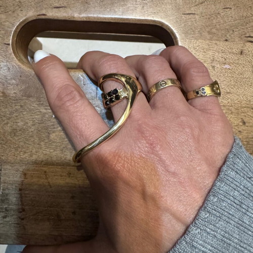 Serpenti style ring in gold stainless steel like new with black zircon stones