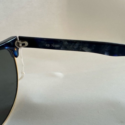 Vintage Kurzenberger sunglasses with blue marbled frame and golden details