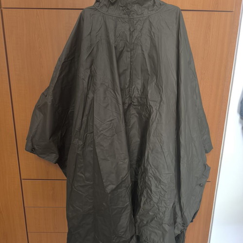 Military poncho used with all buttons functional