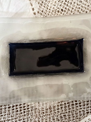 Small blown glass tray new, milky white with deep blue