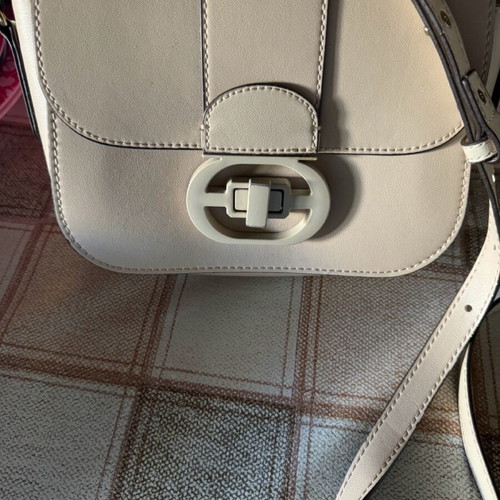 Women's beige crossbody bag like new with adjustable strap