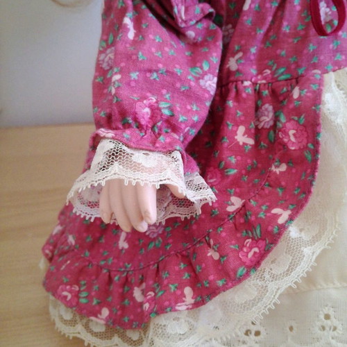 Porcelain doll used, 38cm tall with clothes and shoes