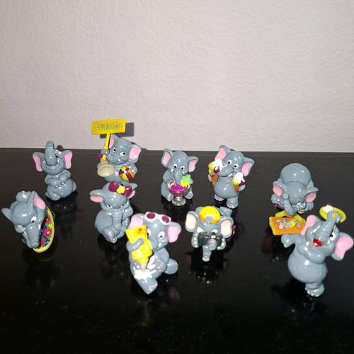 Elephant figurine collection used from Kinder Surprise with damages