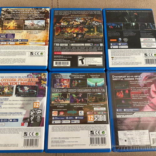 PS Vita game set of 6 like new, including Blazblue, DBZ, Soul Sacrifice